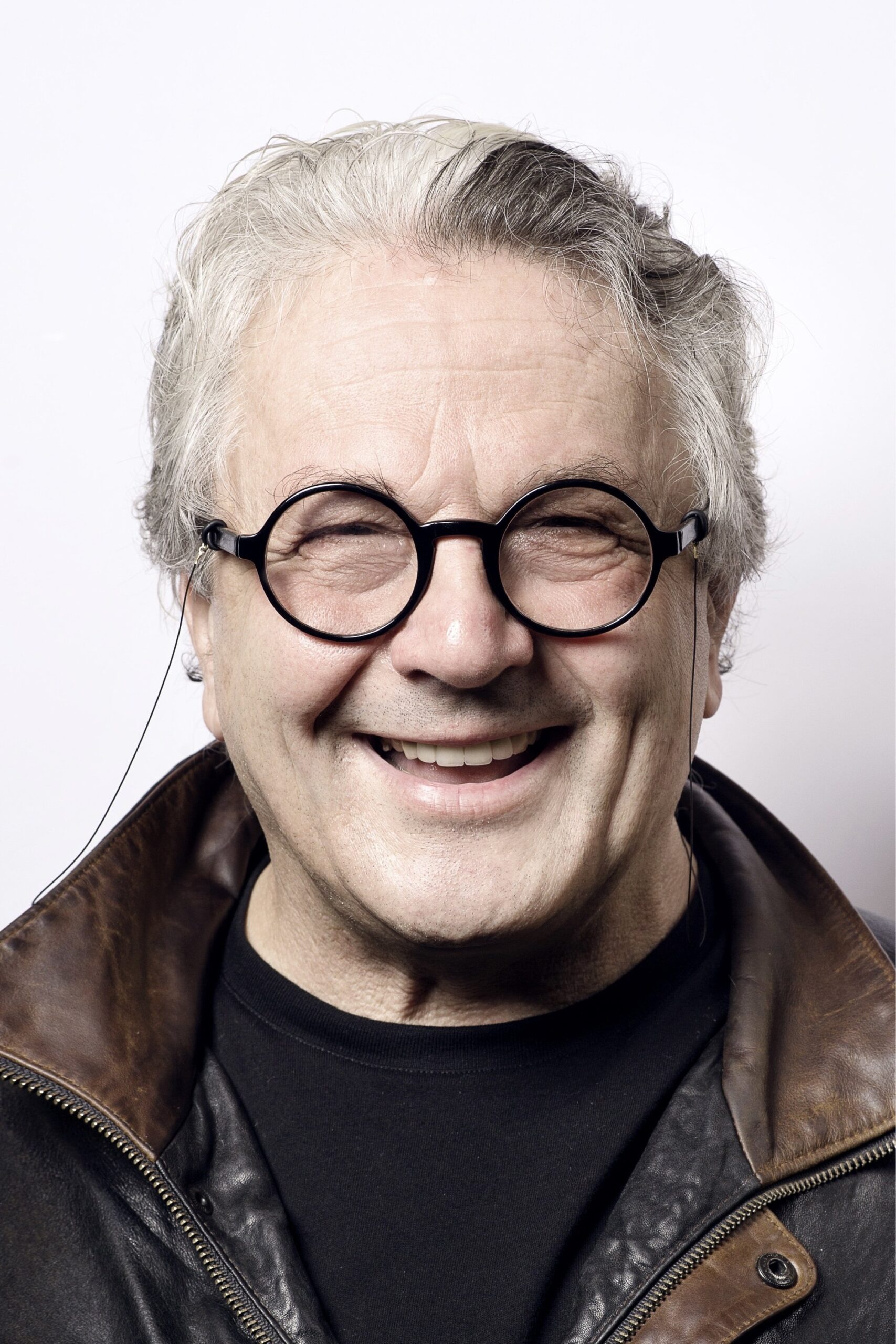 A headshot of George Miller.