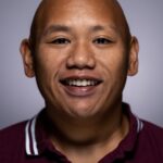 A headshot of Jacob Batalon.