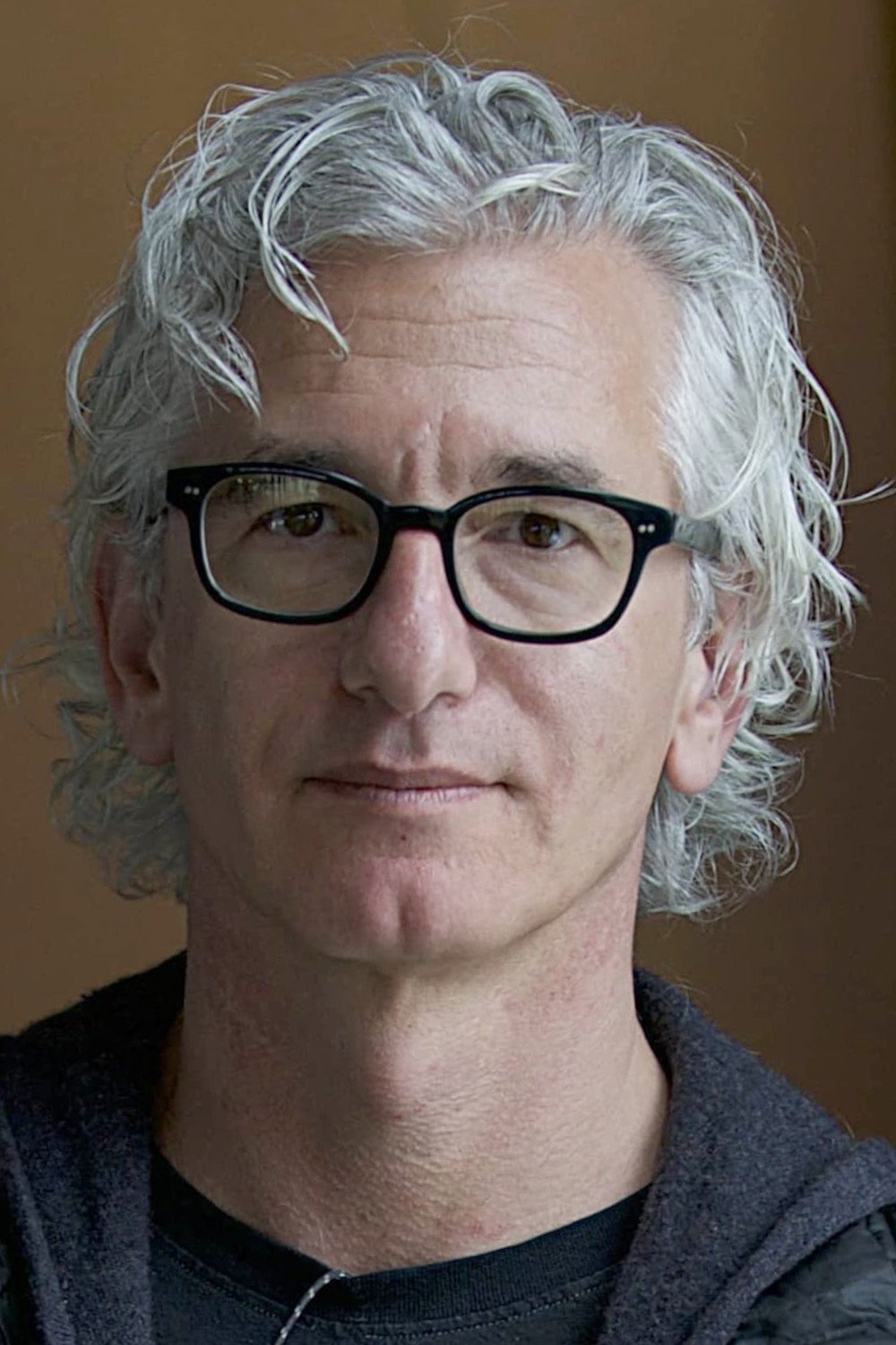 A headshot of Ed Solomon.