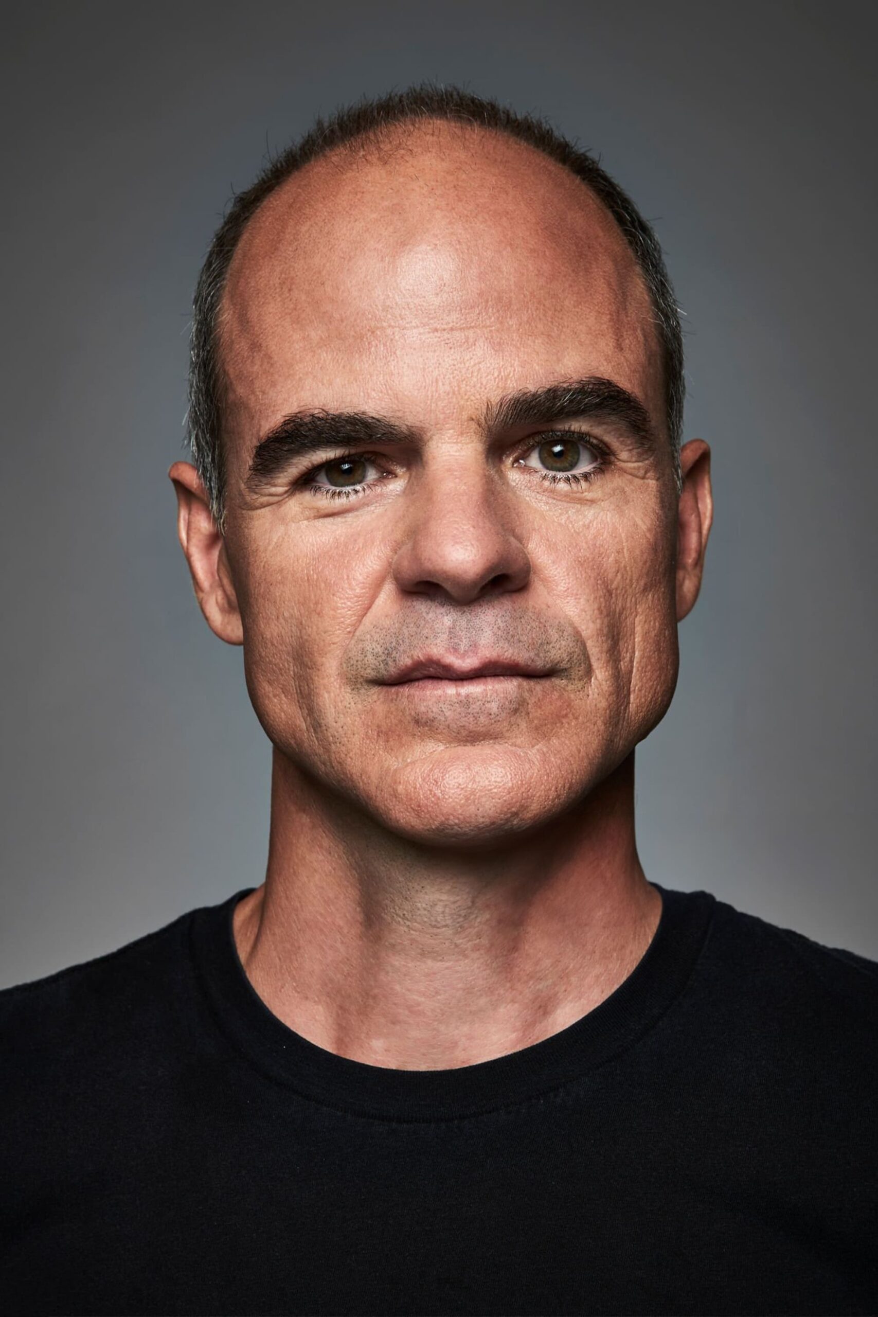 A headshot of Michael Kelly.