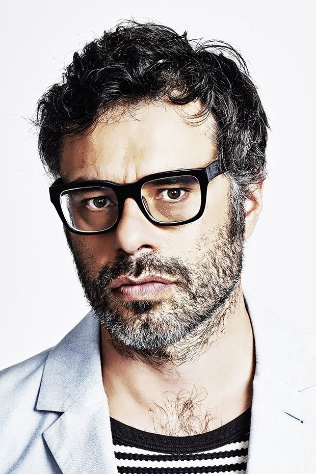 A headshot of Jemaine Clement.