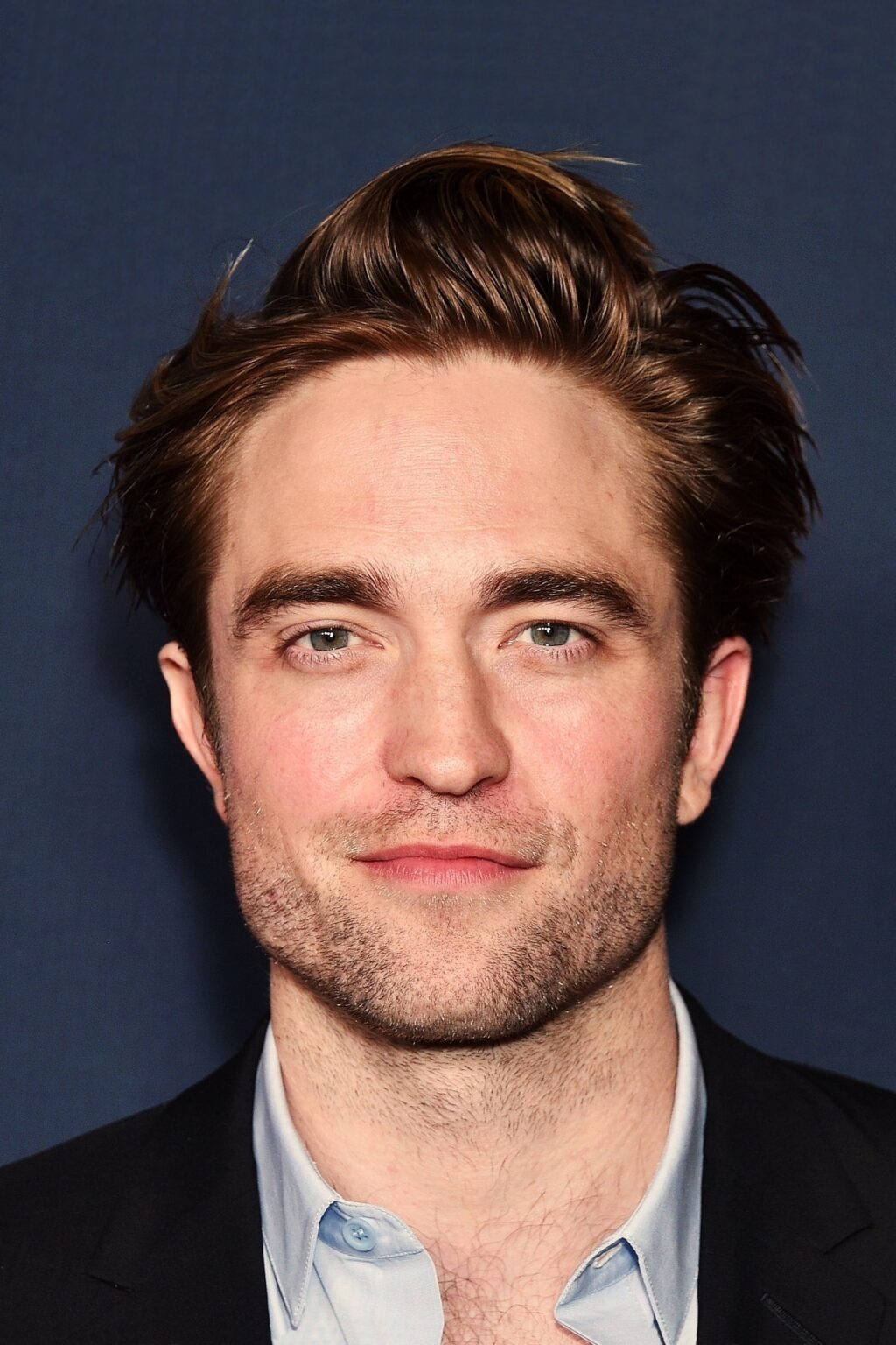 A headshot of Robert Pattinson.