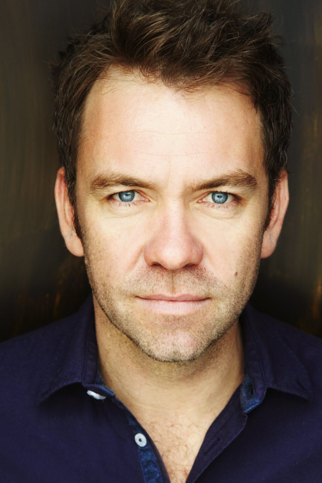 A headshot of Brendan Cowell.
