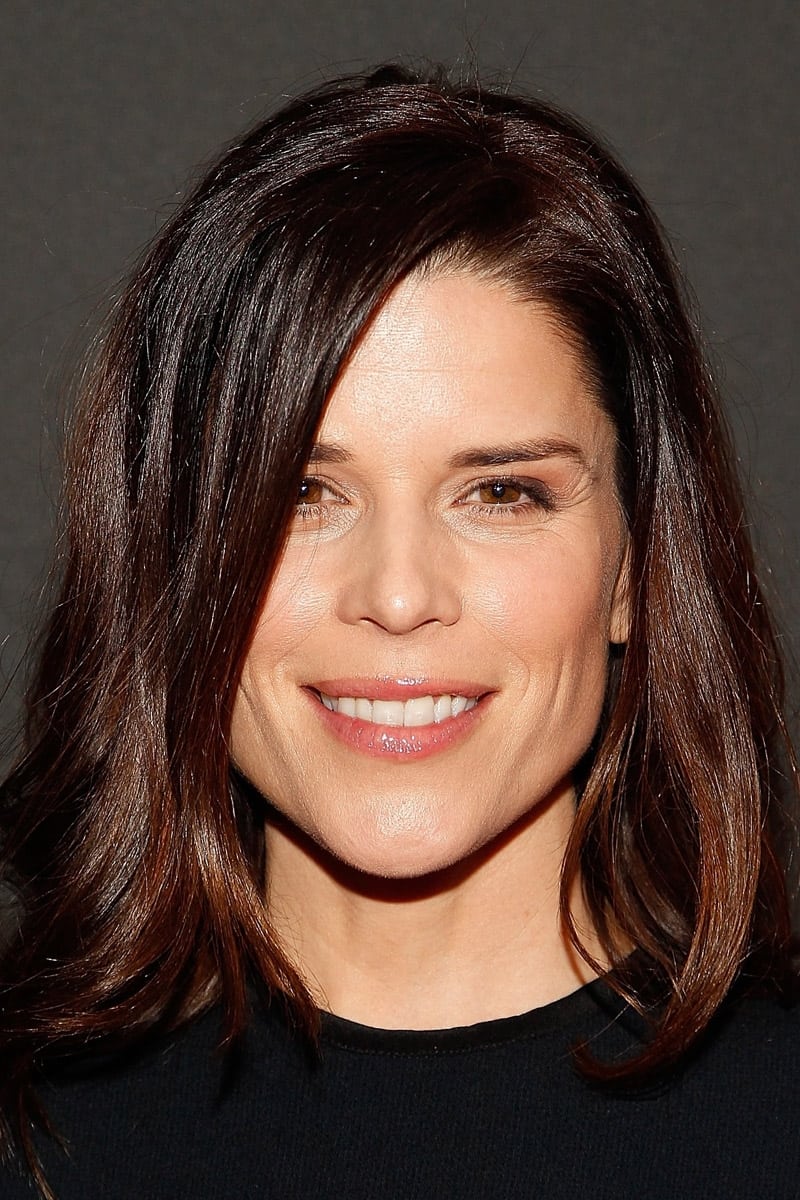 A headshot of Neve Campbell.
