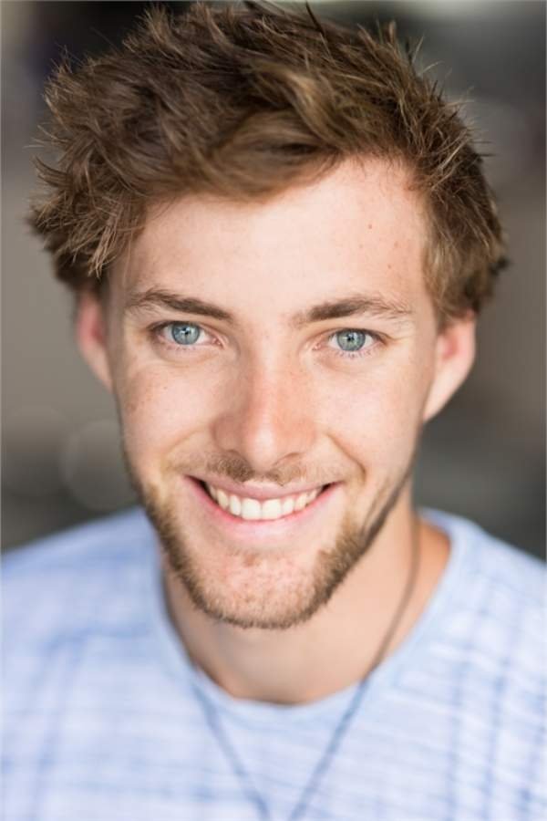 A headshot of Cameron Brown.