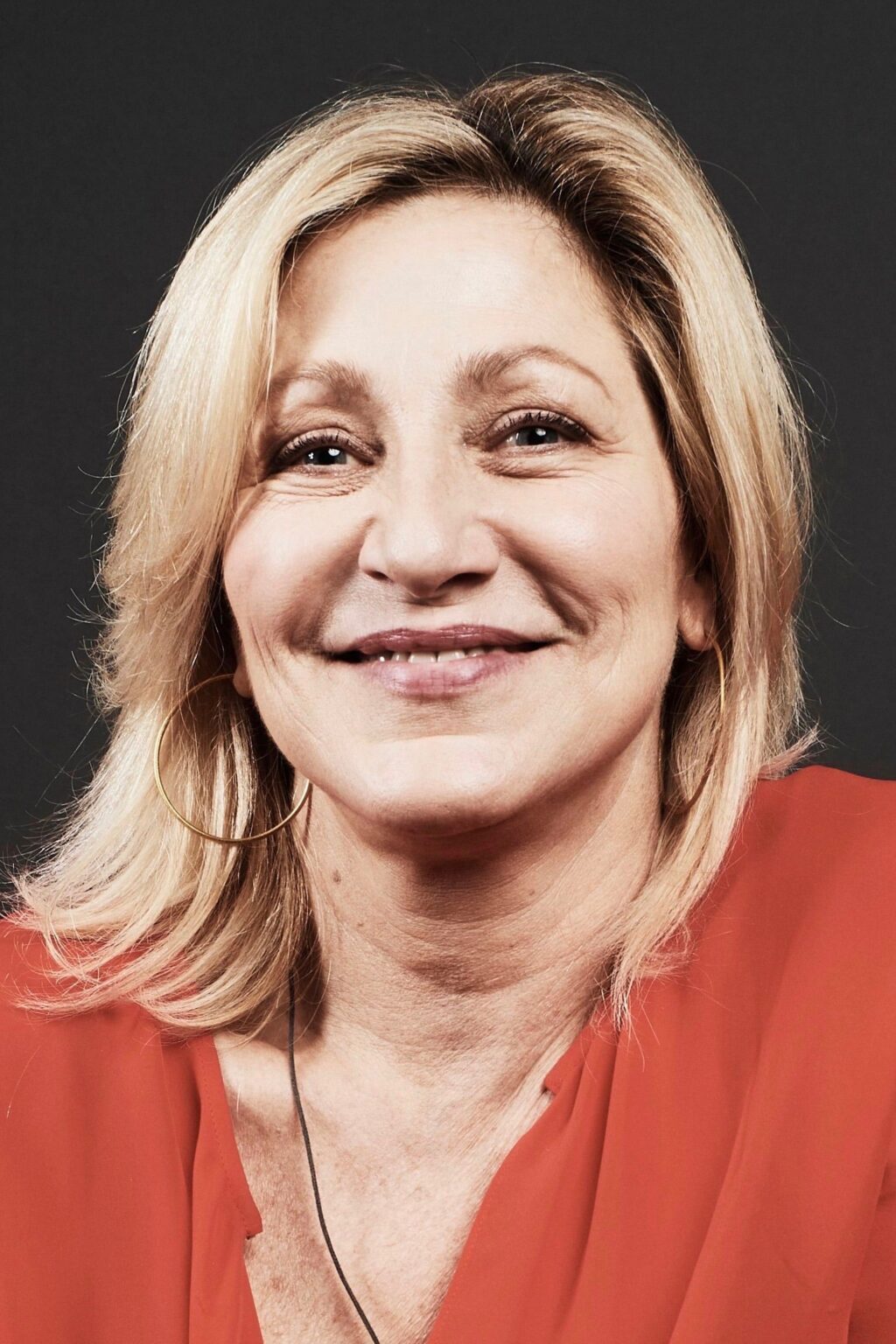 A headshot of Edie Falco.