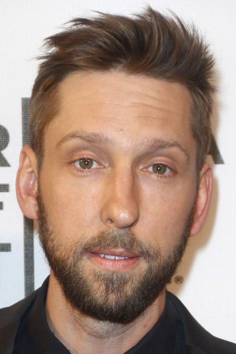 A headshot of Joel David Moore.