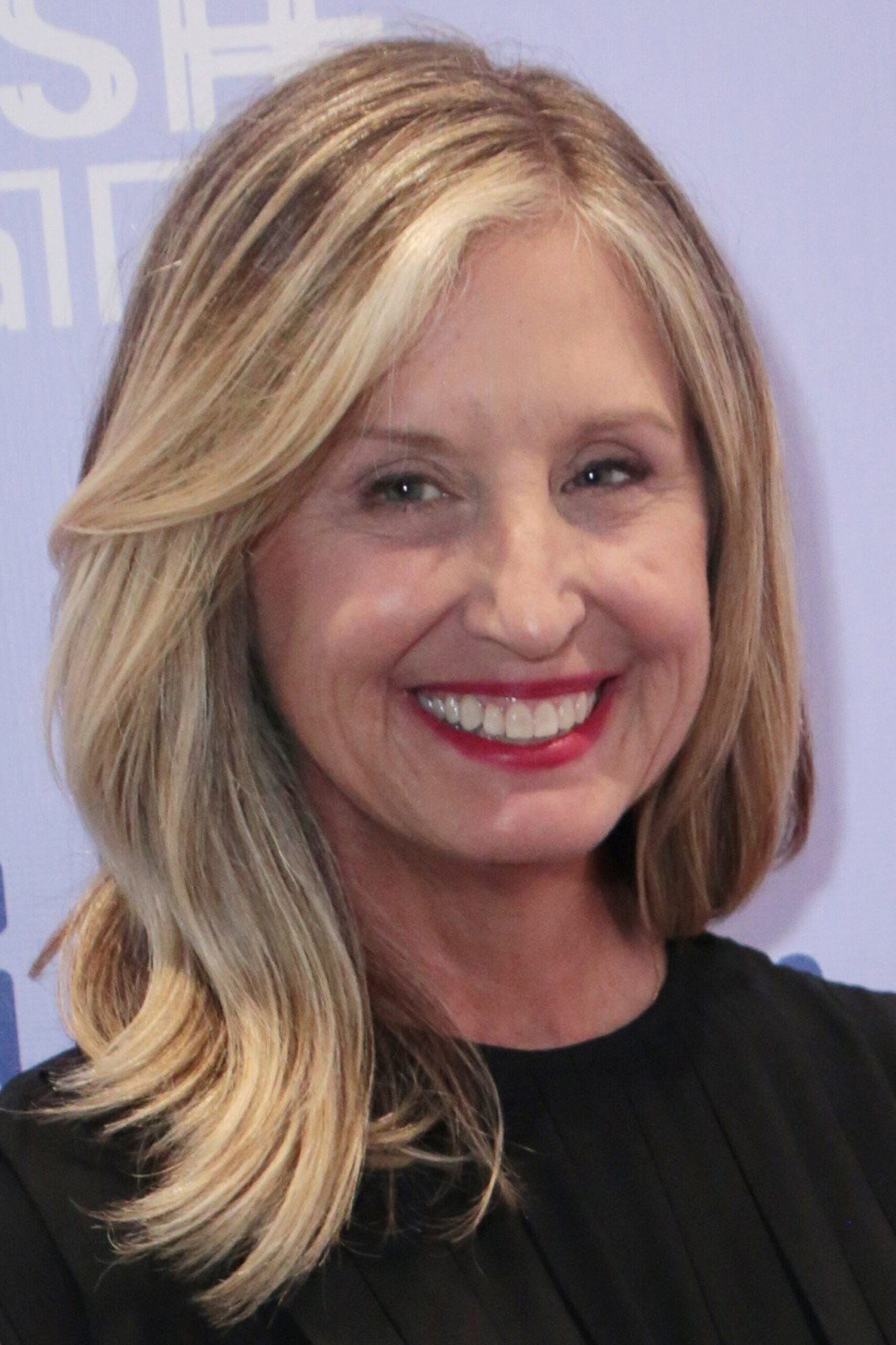 A headshot of Cathy Konrad.