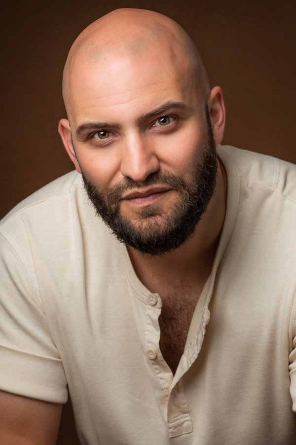 A headshot of Huw Novelli.