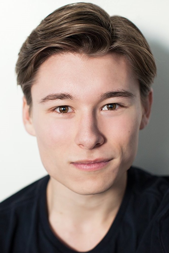 A headshot of Phillip Forest Lewitski.