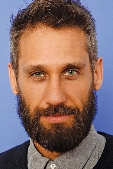 A headshot of Rob Simonsen.