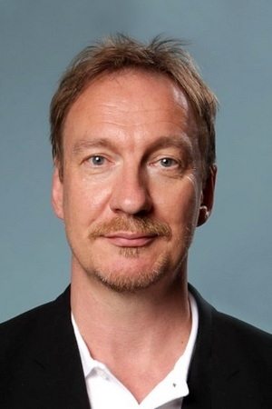 A headshot of David Thewlis.