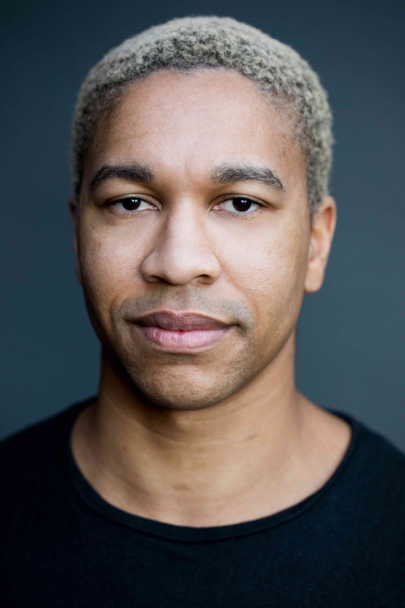 A headshot of Aaron Moten.