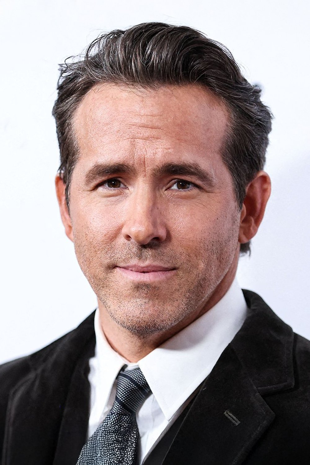 Official headshot photo of person: Ryan Reynolds.