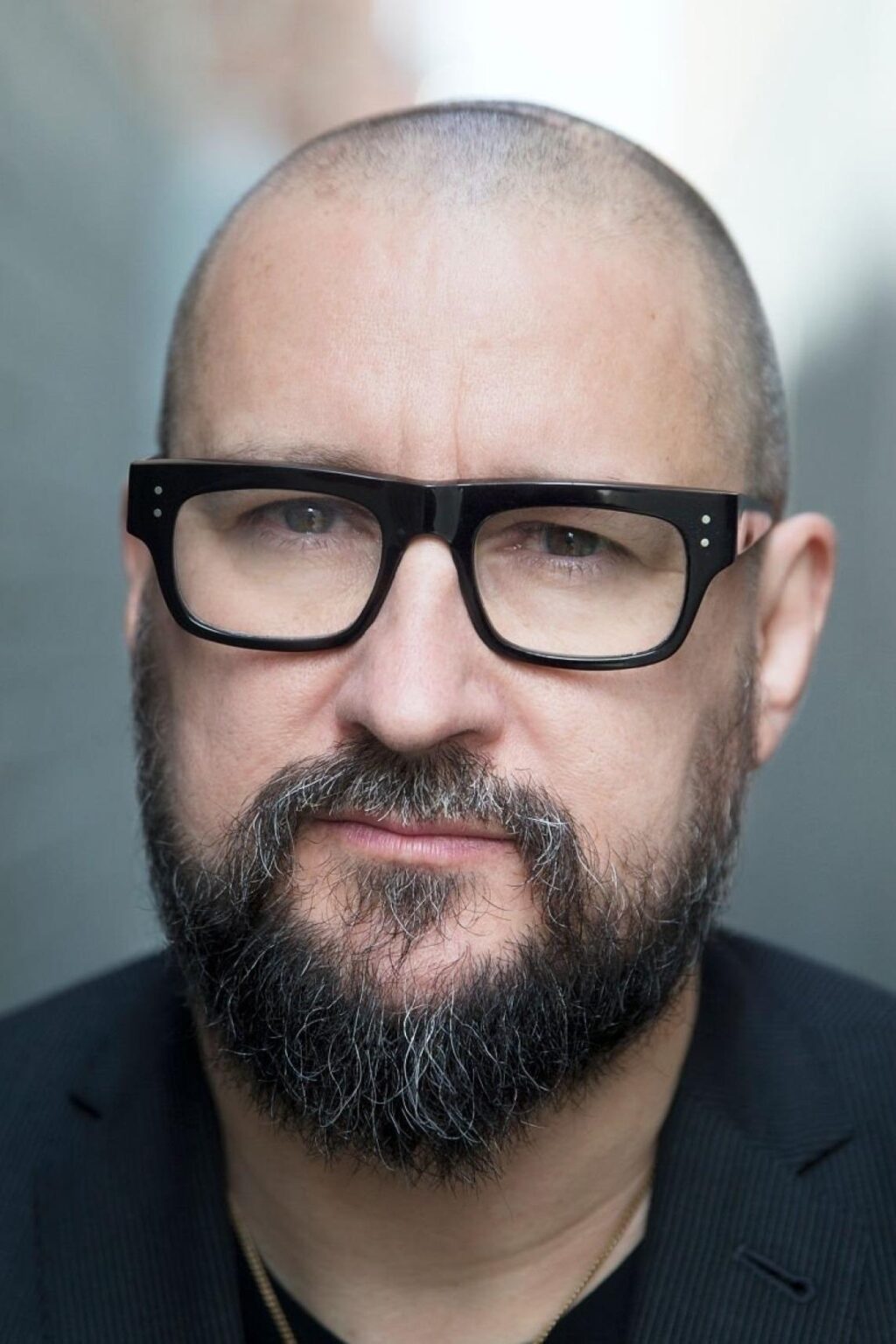Official headshot photo of person: Clint Mansell.