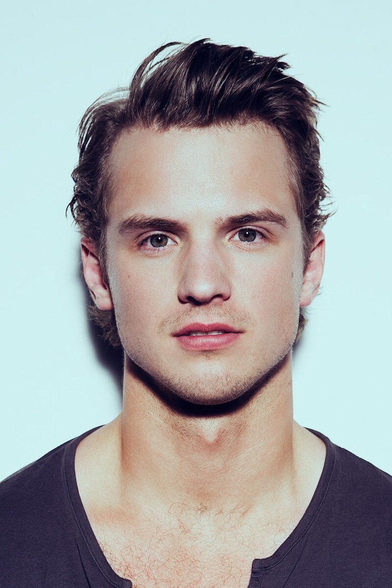 A headshot of Freddie Stroma.