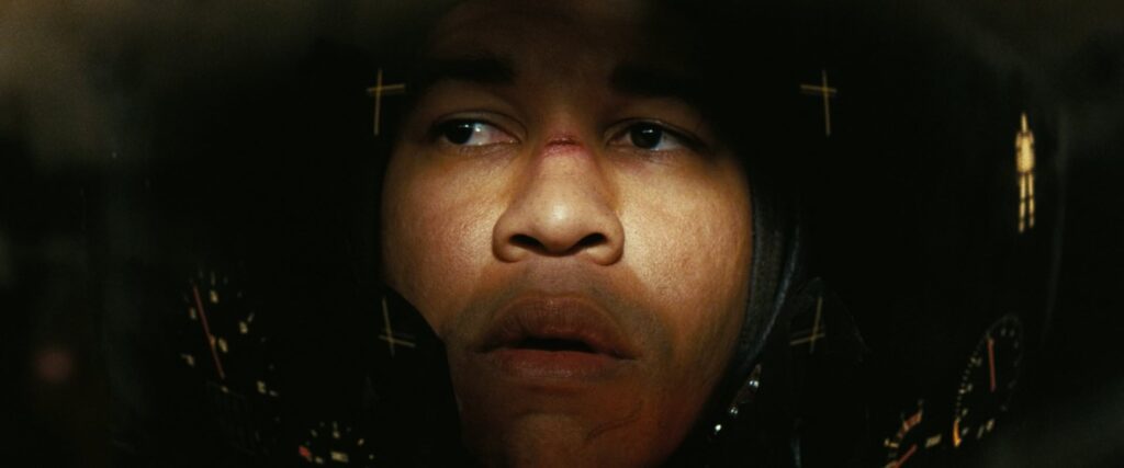 A Dimly lit close up shot of Maximus in Fallout TV Series, Season 1 E2: The Target