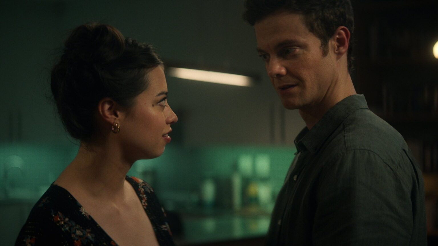 Nate(Jack Quaid) and Sherry(Amber Midthunder) Sharing an intimate moment, in a blurred setting. A a still image from the Movie Novocaine.