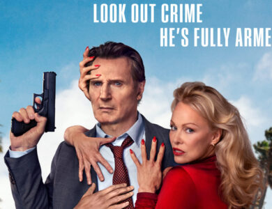 Liam Neeson with a serious expression, holding a handgun, while a woman with red nail polish (Pamela Anderson) embraces him from behind, set against a blue sky with palm trees.