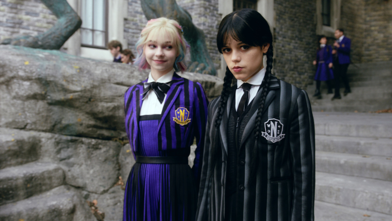 Wednesday Addams and Enid Sinclair in Nevermore Academy uniforms from Wednesday Season 2 trailer.