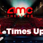 Empty AMC movie theater with 'AMC THEATRES' logo and a cartoon alarm clock character with 'Times Up' text, symbolizing the industry's decline.