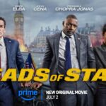 John Cena, Idris Elba, and Priyanka Chopra Jonas armed and ready, standing in a gritty, industrial setting from Heads of State.