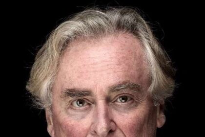 A headshot of John Howard.