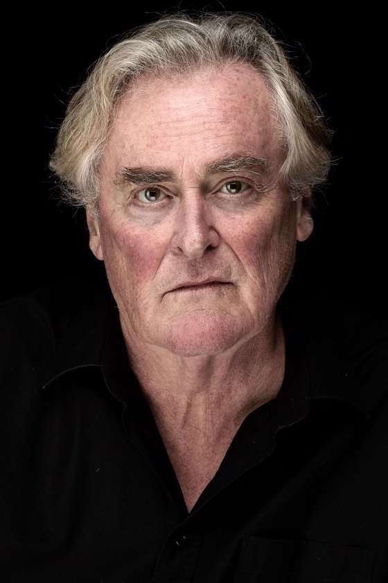 A headshot of John Howard.