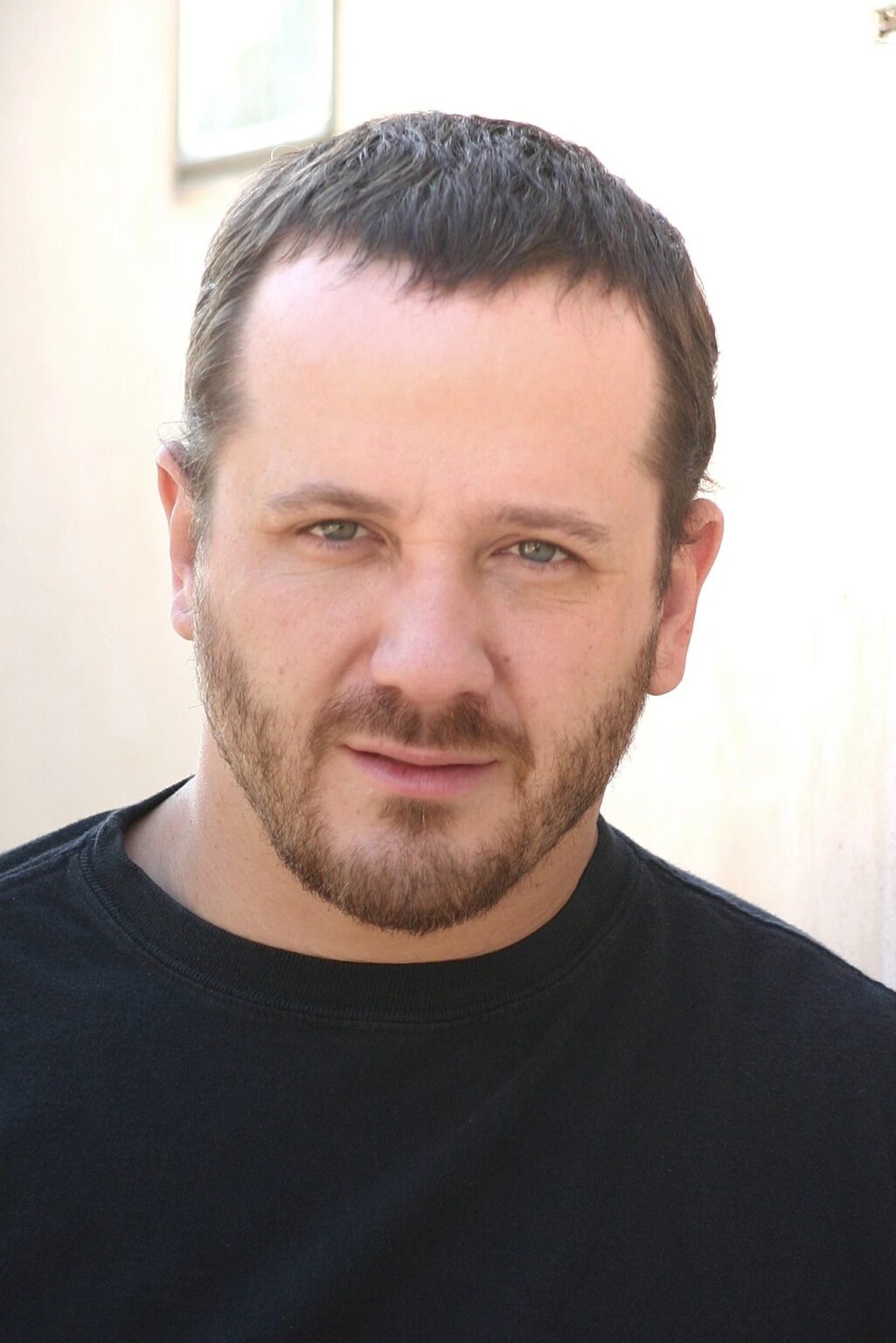 A headshot of Randall Archer.