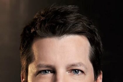 A headshot of Sean Hayes.