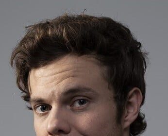 A headshot of Jack Quaid.