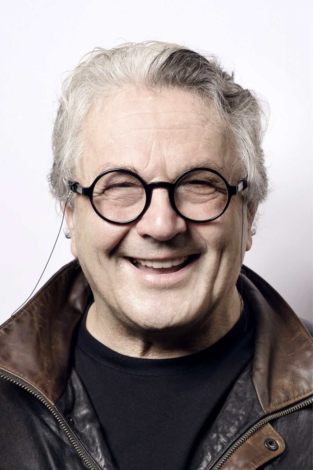 A headshot of George Miller.