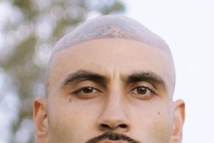 A headshot of Matuse Paz.