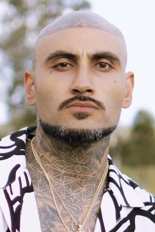 A headshot of Matuse Paz.