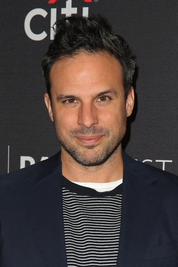 A headshot of Tom Gormican.