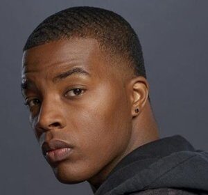 A headshot of Daniel Ezra.