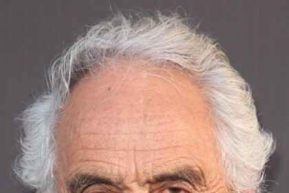 A headshot of Tommy Chong.