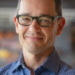 A headshot of Mike Jones.