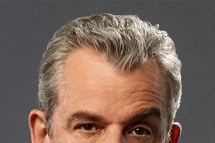 A headshot of Danny Huston.