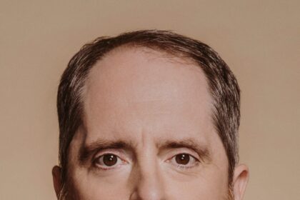 A headshot of Brendan Hunt.