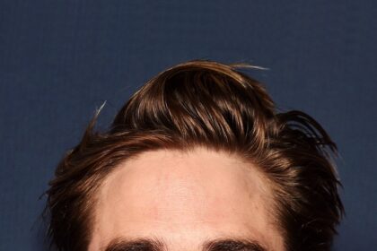 A headshot of Robert Pattinson.