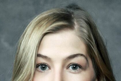 A headshot of Rosamund Pike.
