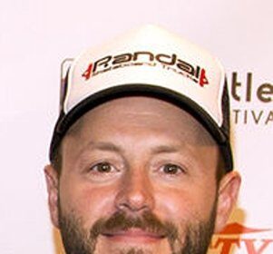 A headshot of Patrick Aison.