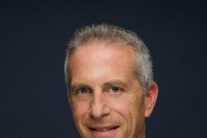 A headshot of Marc Platt.