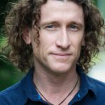 A headshot of David Collins.