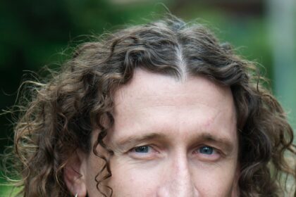 A headshot of David Collins.