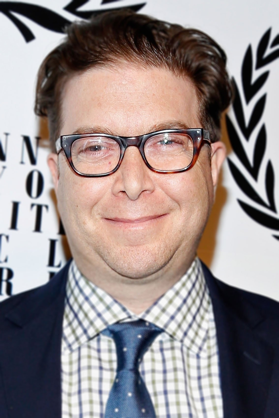 A headshot of Eric Warren Singer.