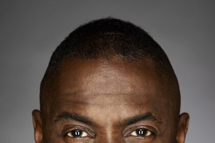 A headshot of Idris Elba.
