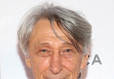 A headshot of George Shevtsov.