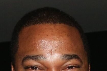 A headshot of Busta Rhymes.